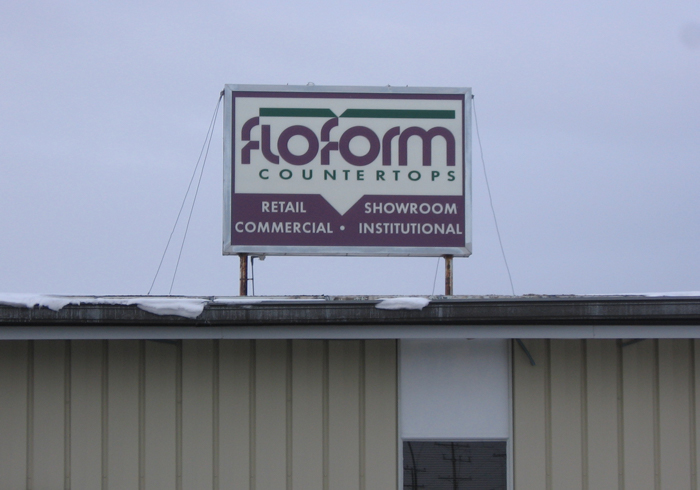 about us floform old signage